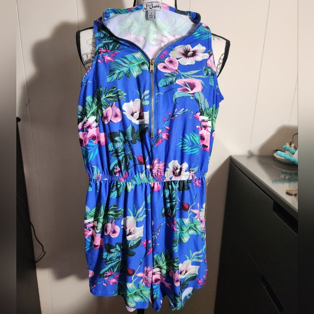 Floral print blue romper.